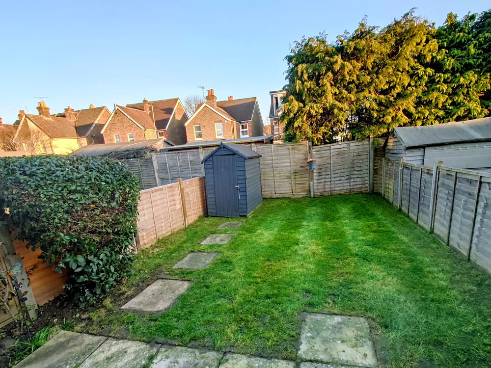 Neat little terraced house back garden freshly mowed